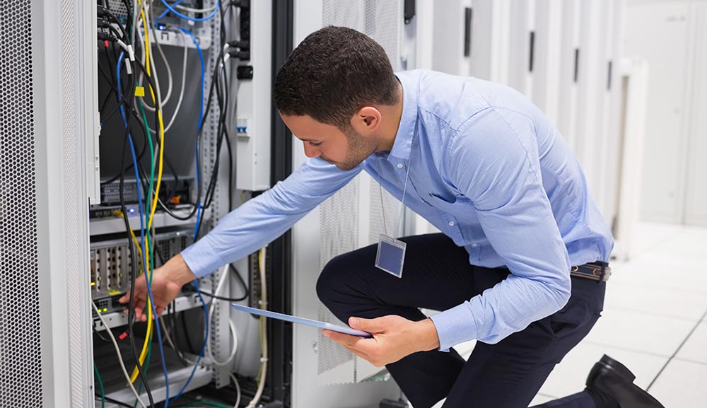 IT tech working on server